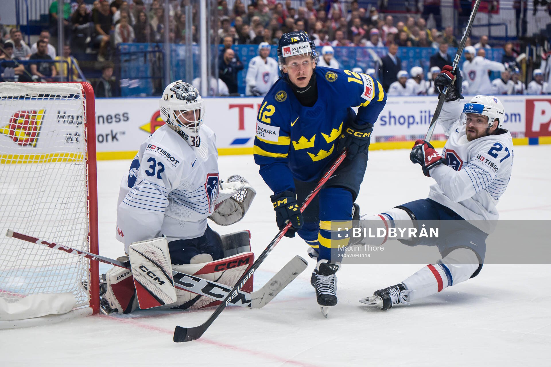 Max Friberg of Sweden against goaltender Quentin Papillon