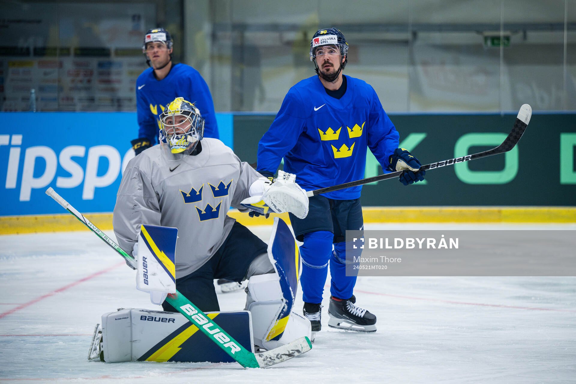 Goaltender Filip Gustavsson and Marcus Johansson of Sweden