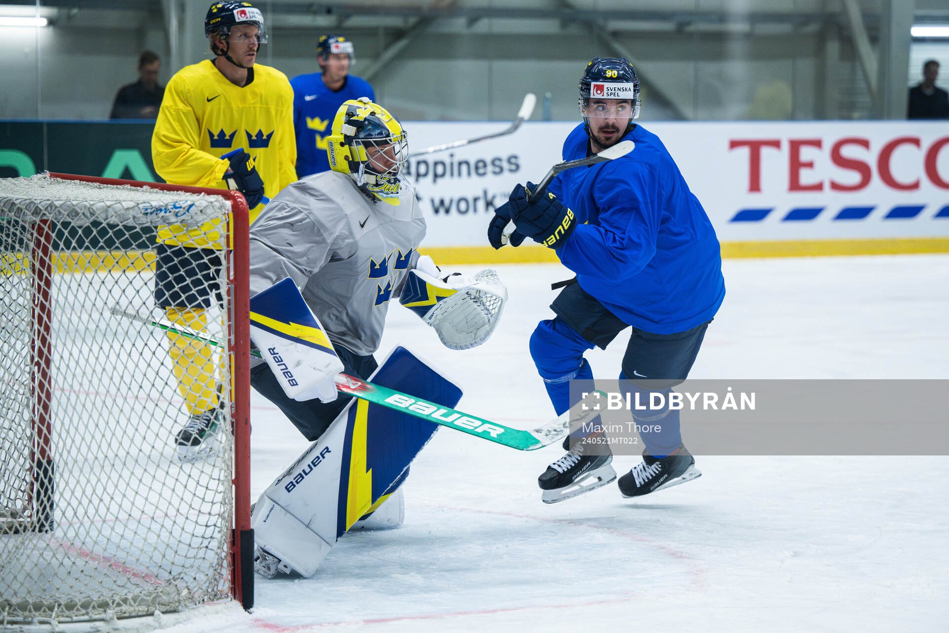 Goaltender Filip Gustavsson and Marcus Johansson of Sweden