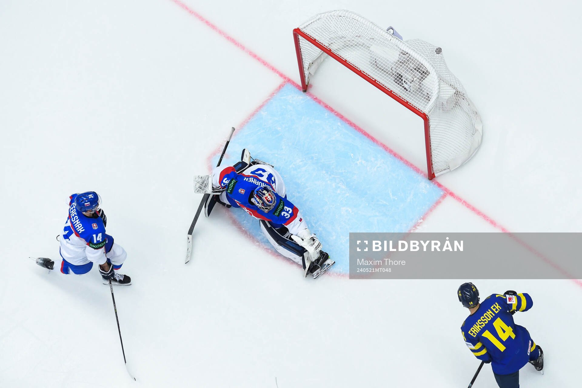 Lucas Raymond of Sweden (not pictured) scores 1-0 behind