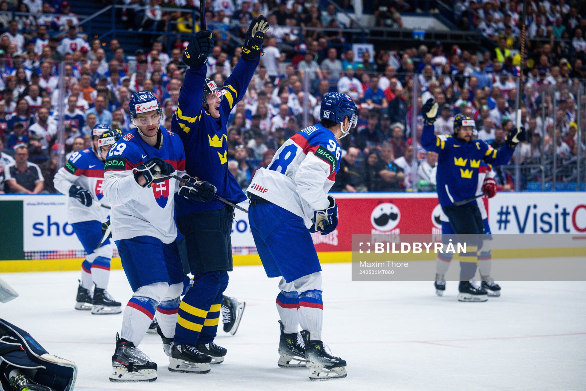Pontus Holmberg and Erik Karlsson of Sweden celebrates the