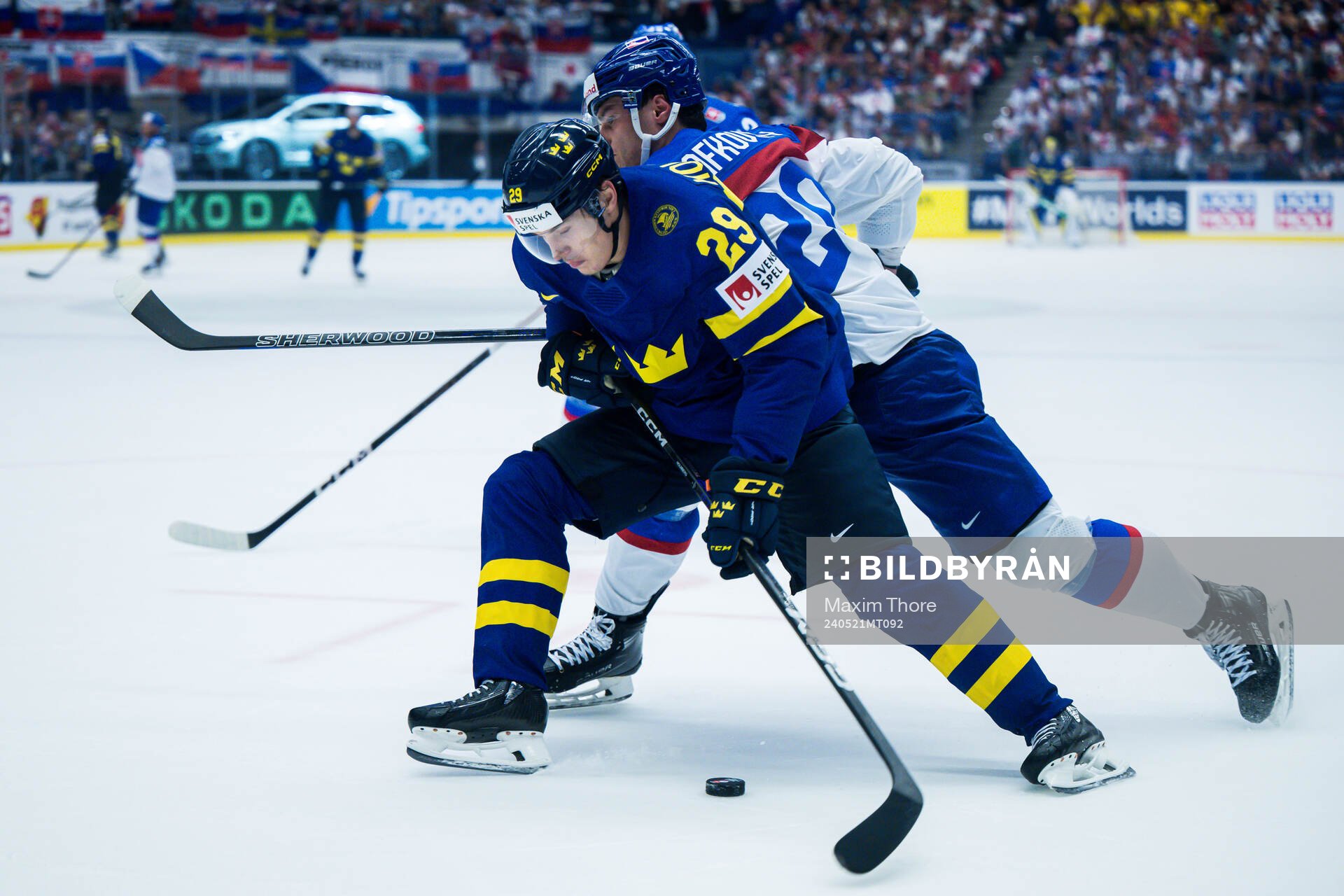 Pontus Holmberg of Sweden and Juraj Slafkovsky of Slovakia