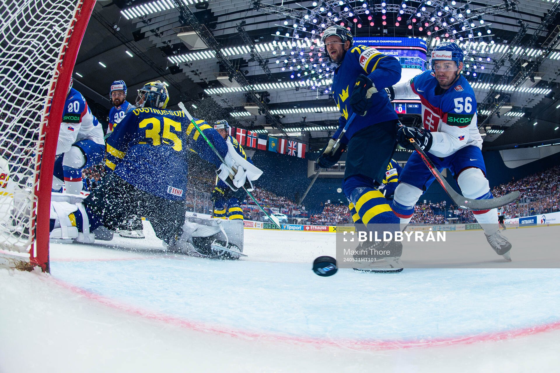 Goaltender Filip Gustavsson, Tim Heed of Sweden against
