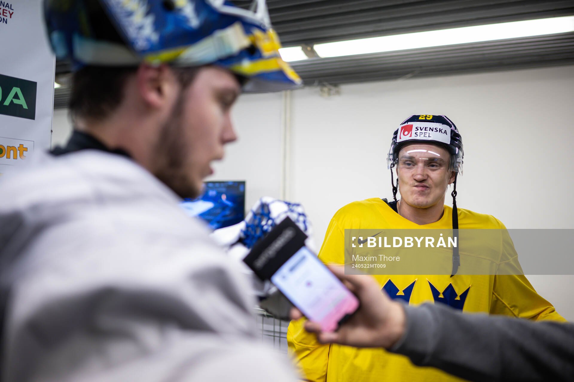 Goaltender Jesper Wallstedt and Pontus Holmberg of Sweden
