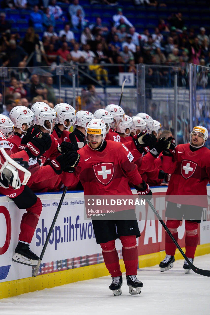 Christoph Bertschy of Switzerland celebrates the 3-1 goal