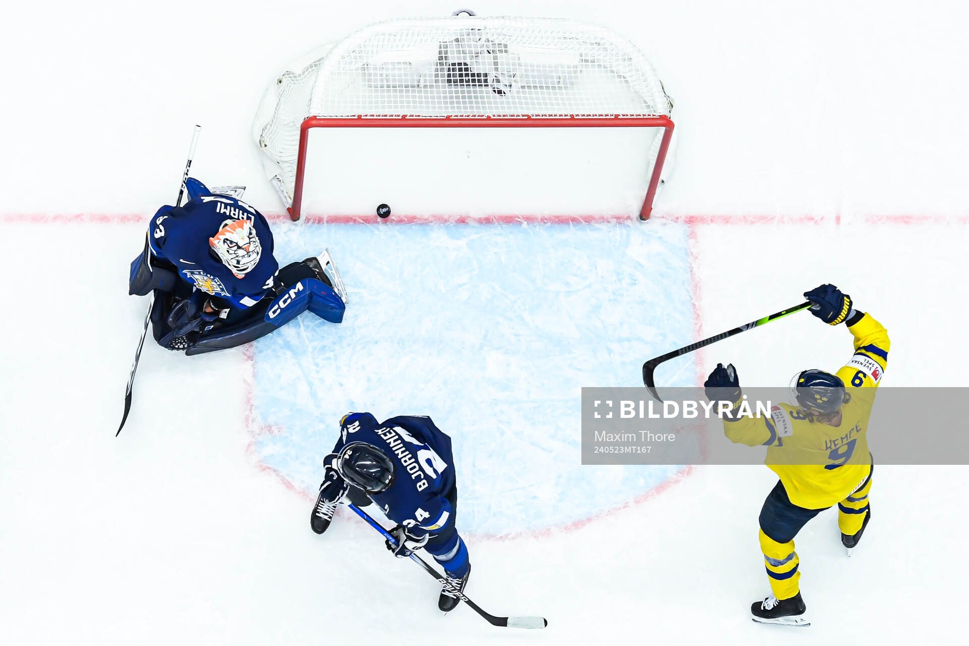 Rasmus Dahlin of Sweden (not in frame) scores 1-0 behind