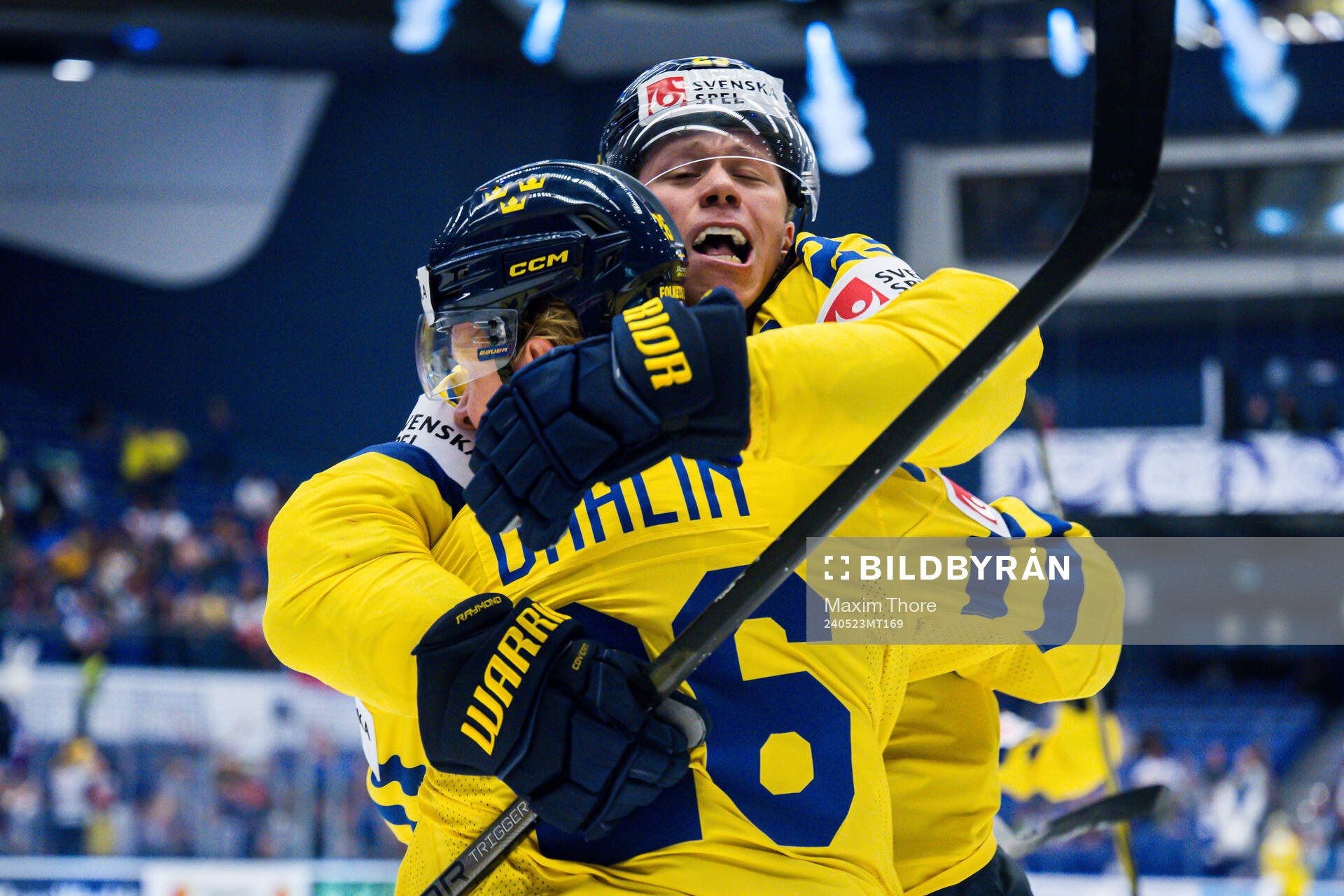 Rasmus Dahlin and Lucas Raymond of Sweden celebrates
