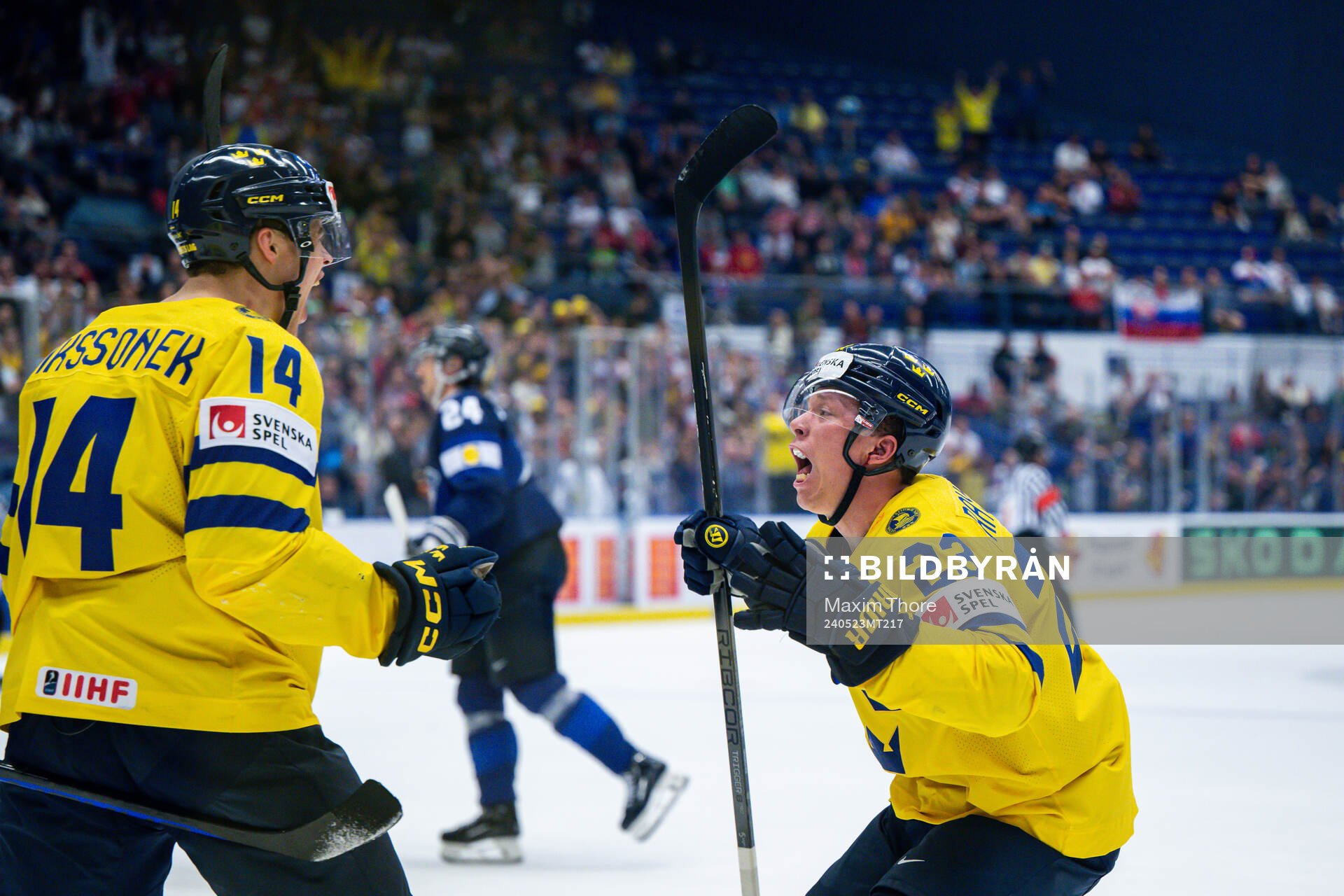 Joel Eriksson Ek and Lucas Raymond of Sweden celebrates