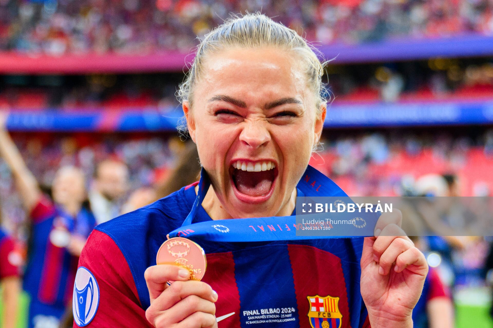 Fridolina Rolfö of Barcelona celebrates with her gold medal