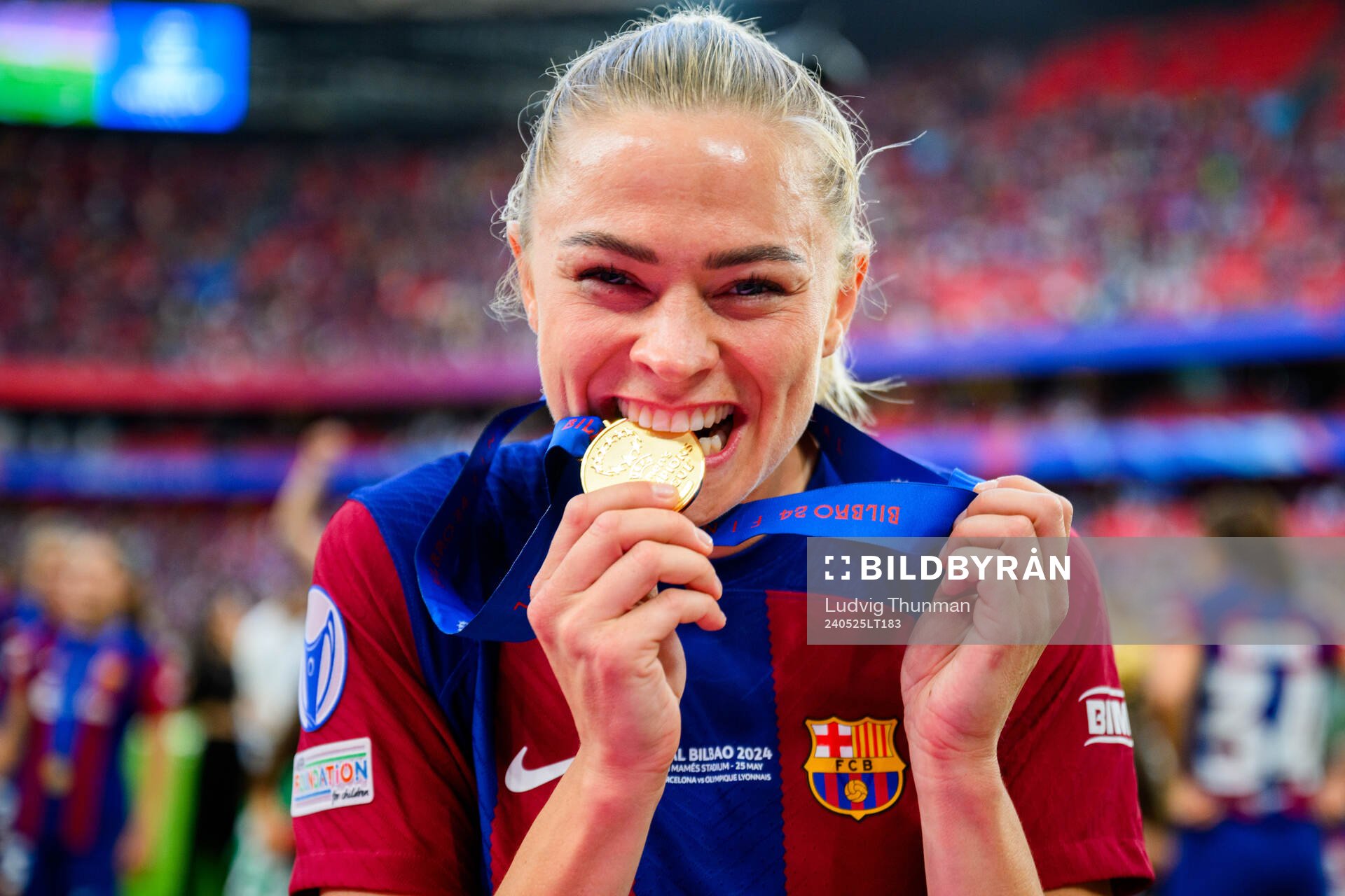 Fridolina Rolfö of Barcelona celebrates with her gold medal