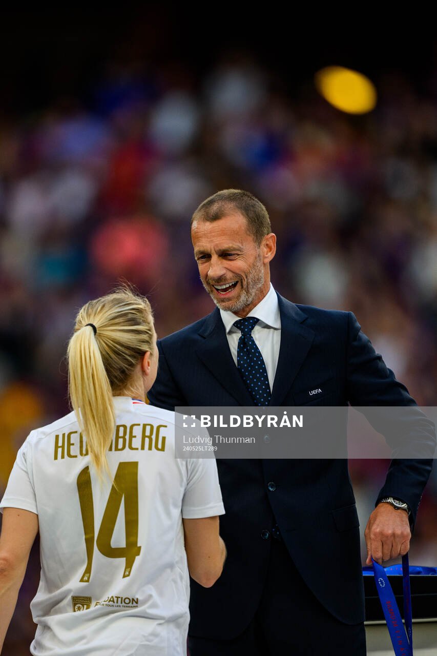 UEFA president Aleksander Ceferin and Ada Hegerberg of Lyon