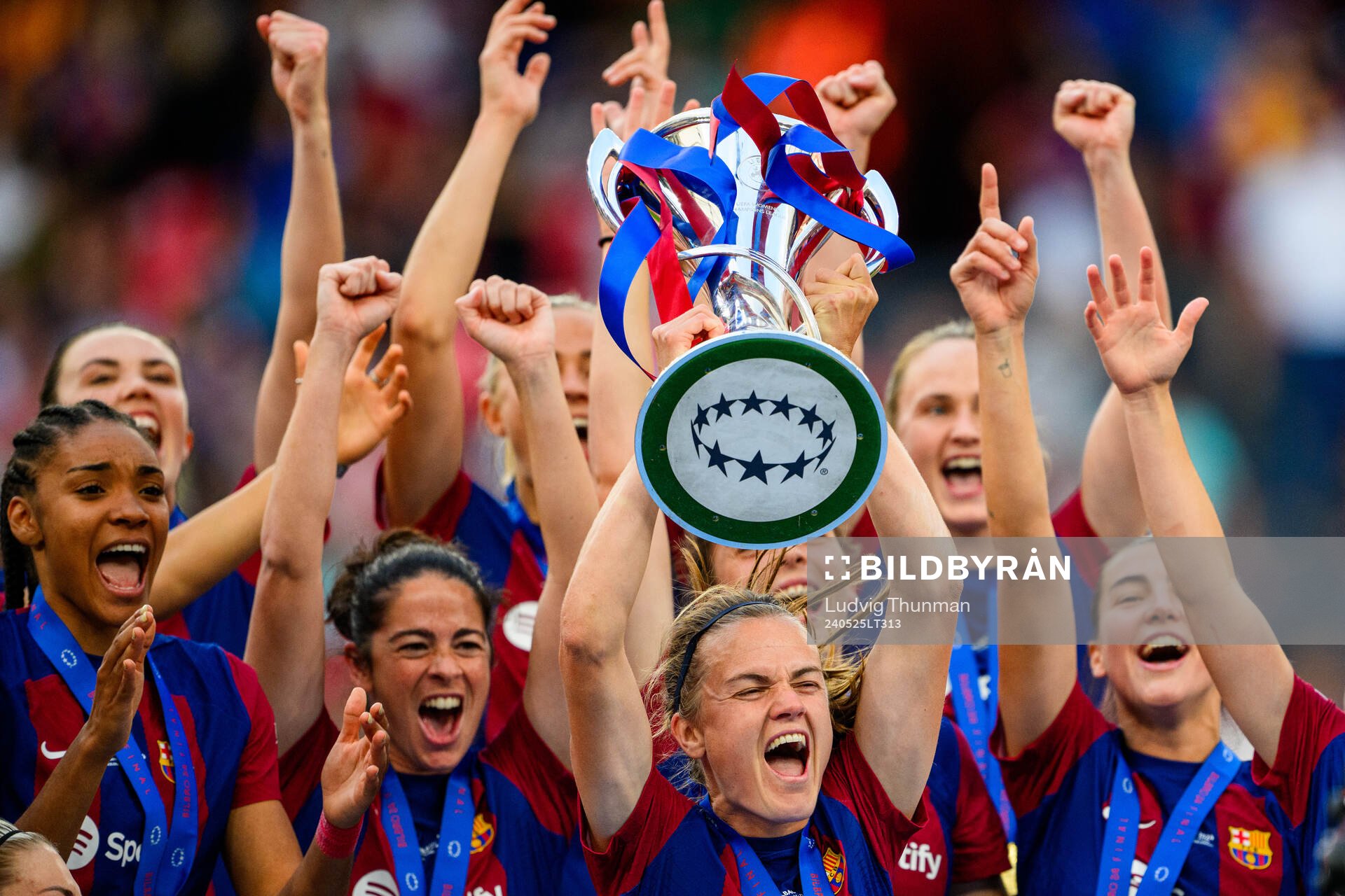 Irene Paredes of Barcelona lifts the trophy