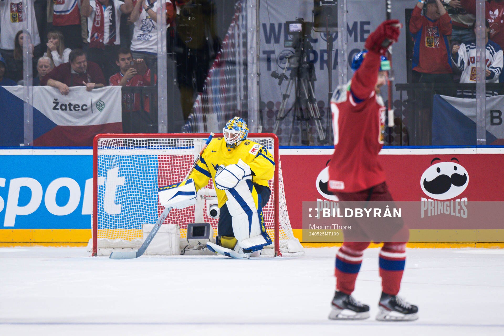 Goaltender Samuel Ersson of Sweden looks dejected