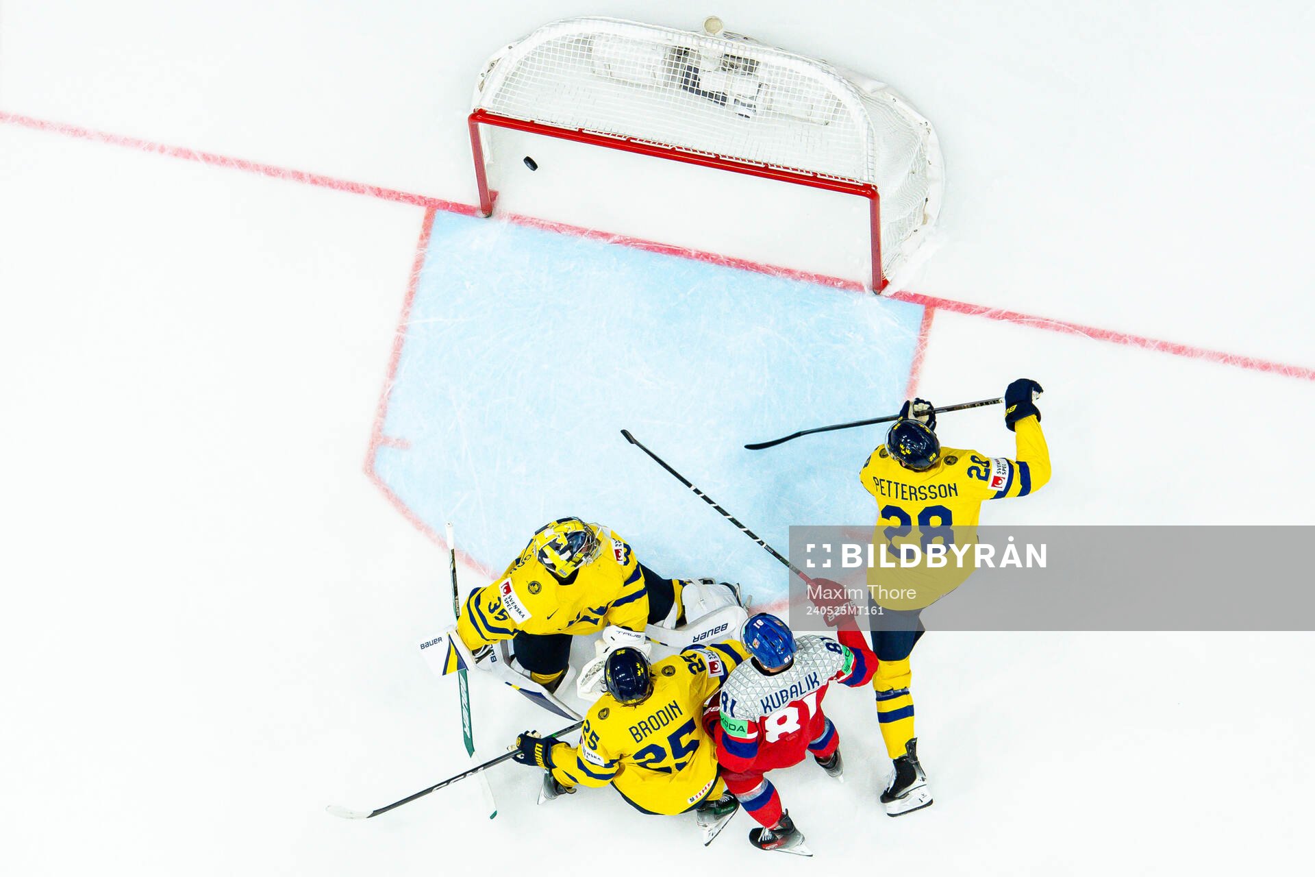 Goaltender Filip Gustavsson, Marcus Pettersson and Jonas
