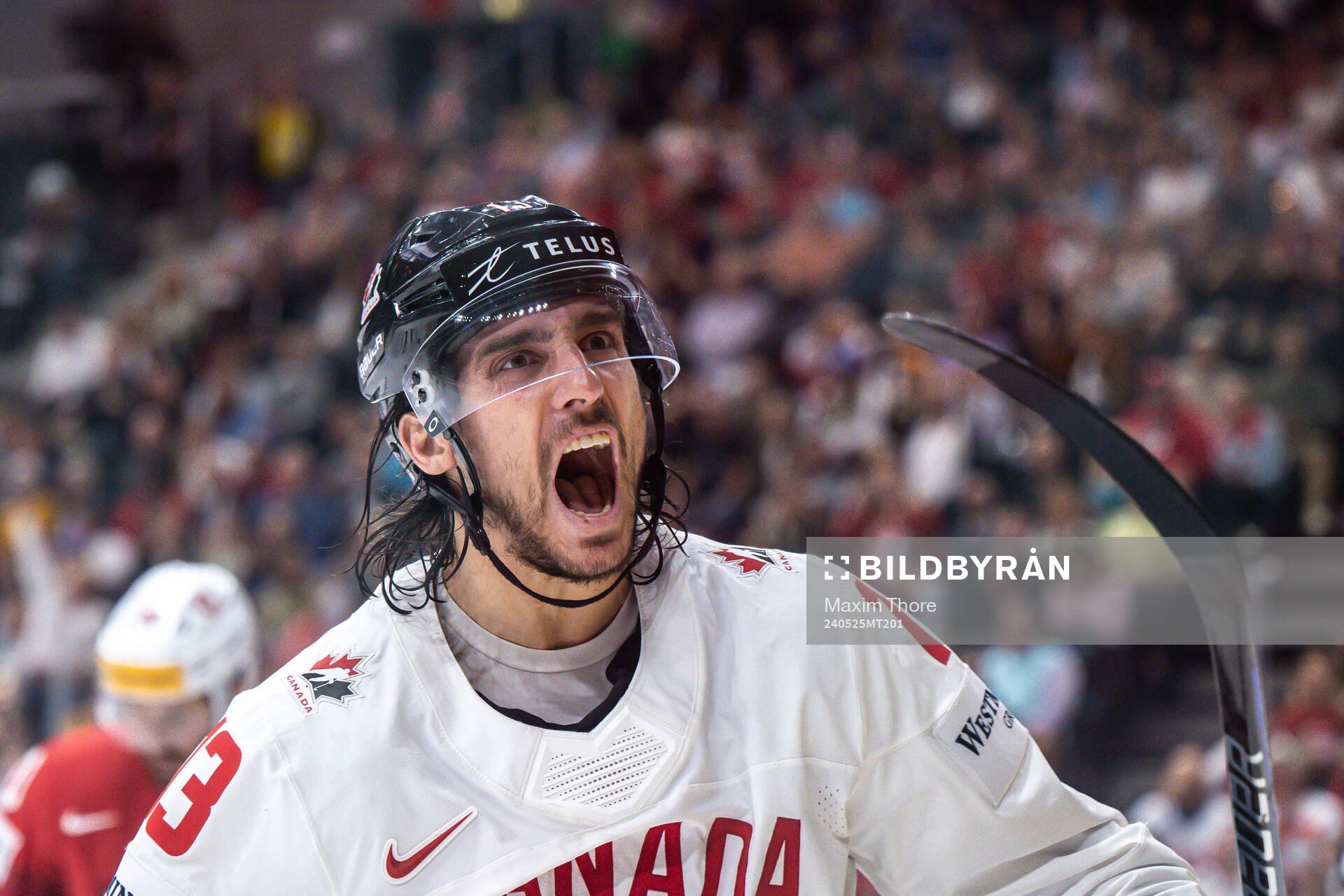 Brandon Tanev of Canada celebrates the 1-2 goal