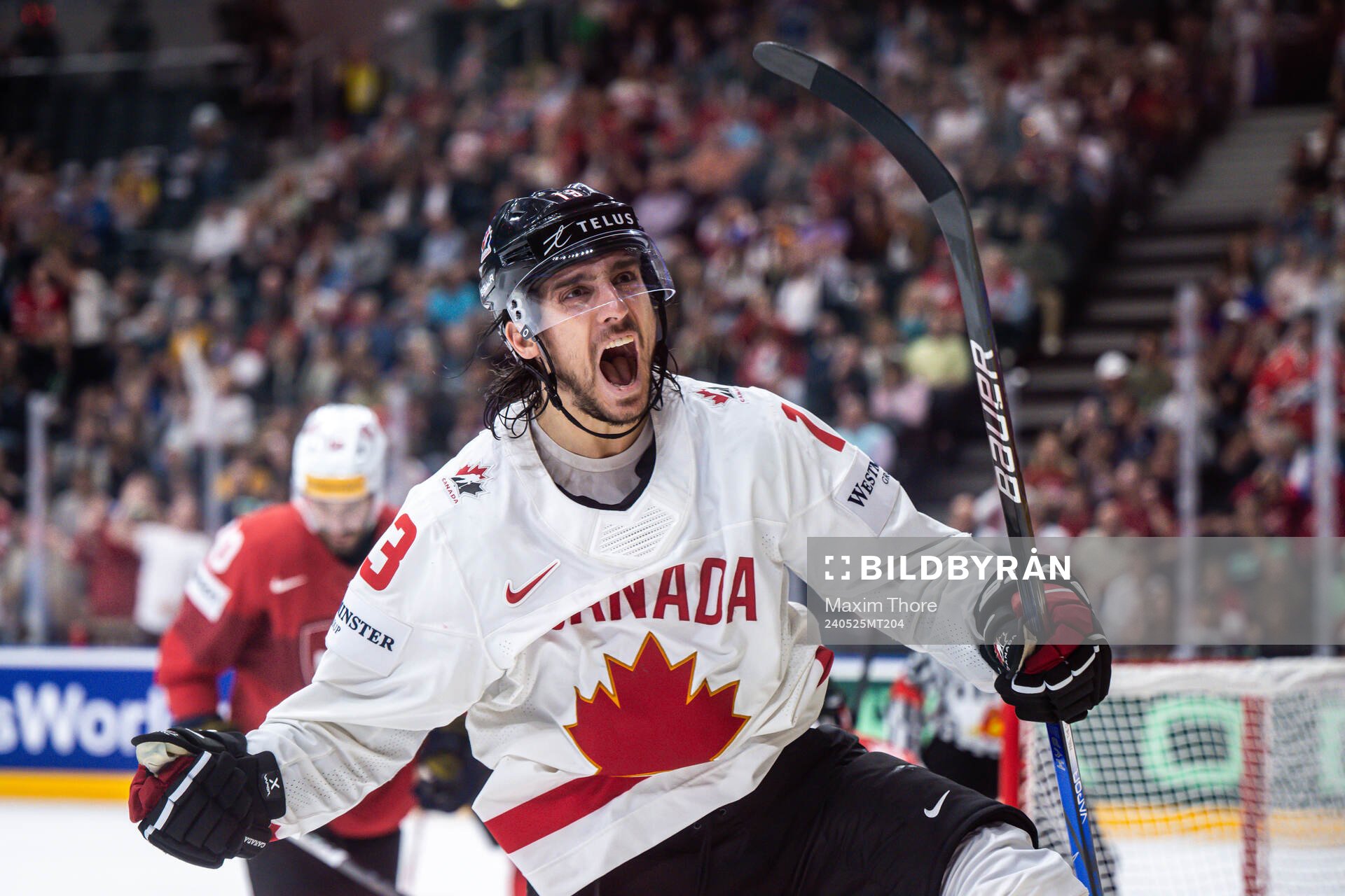 Brandon Tanev of Canada celebrates the 1-2 goal