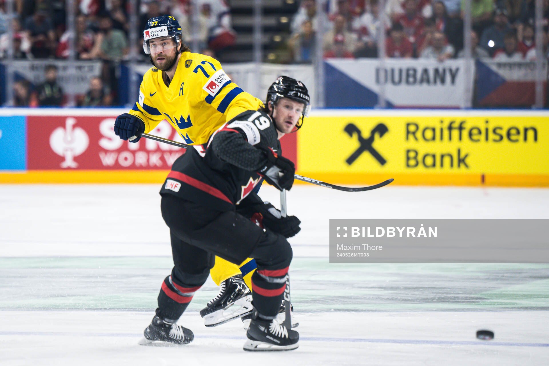 Victor Hedman of Sweden and Jared McCann of Canada