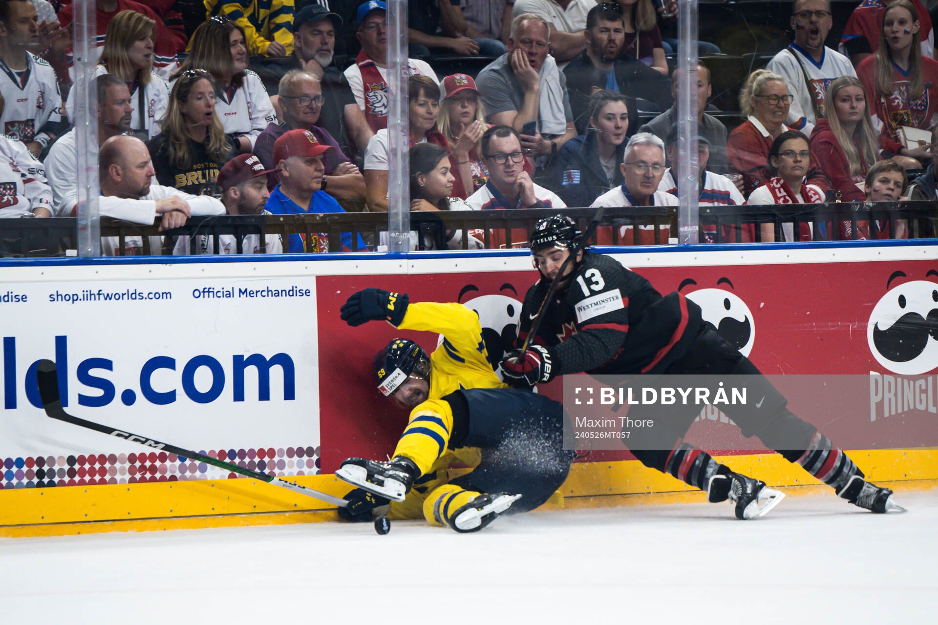 Linus Johansson of Sweden and Brandon Tanev of Canada