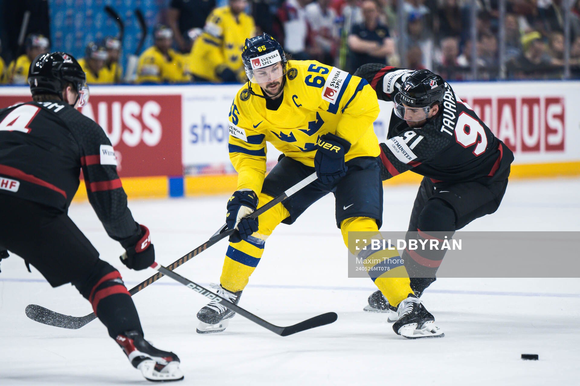 Erik Karlsson of Sweden and John Tavares of Canada