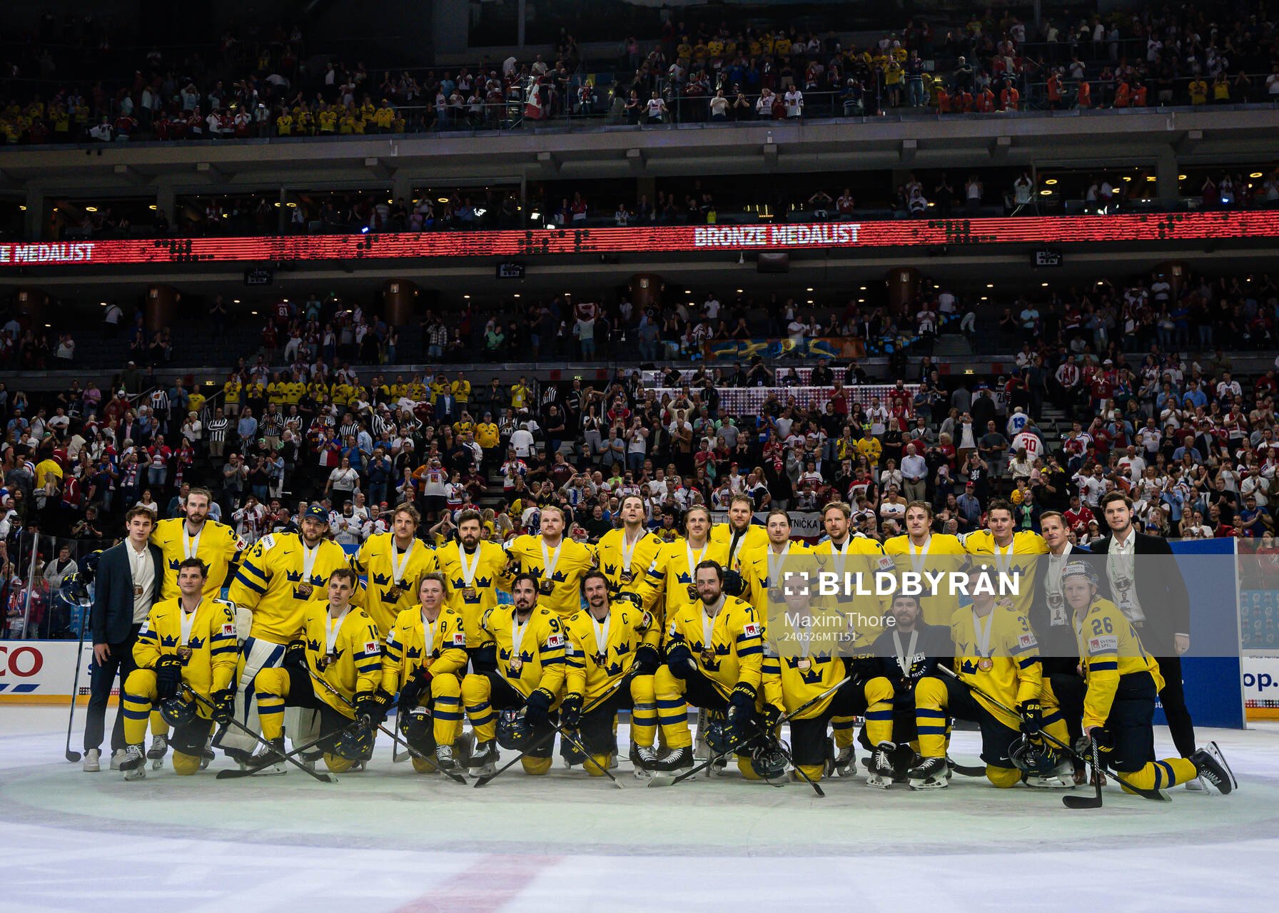 The players of Sweden celebrate their bronze medal