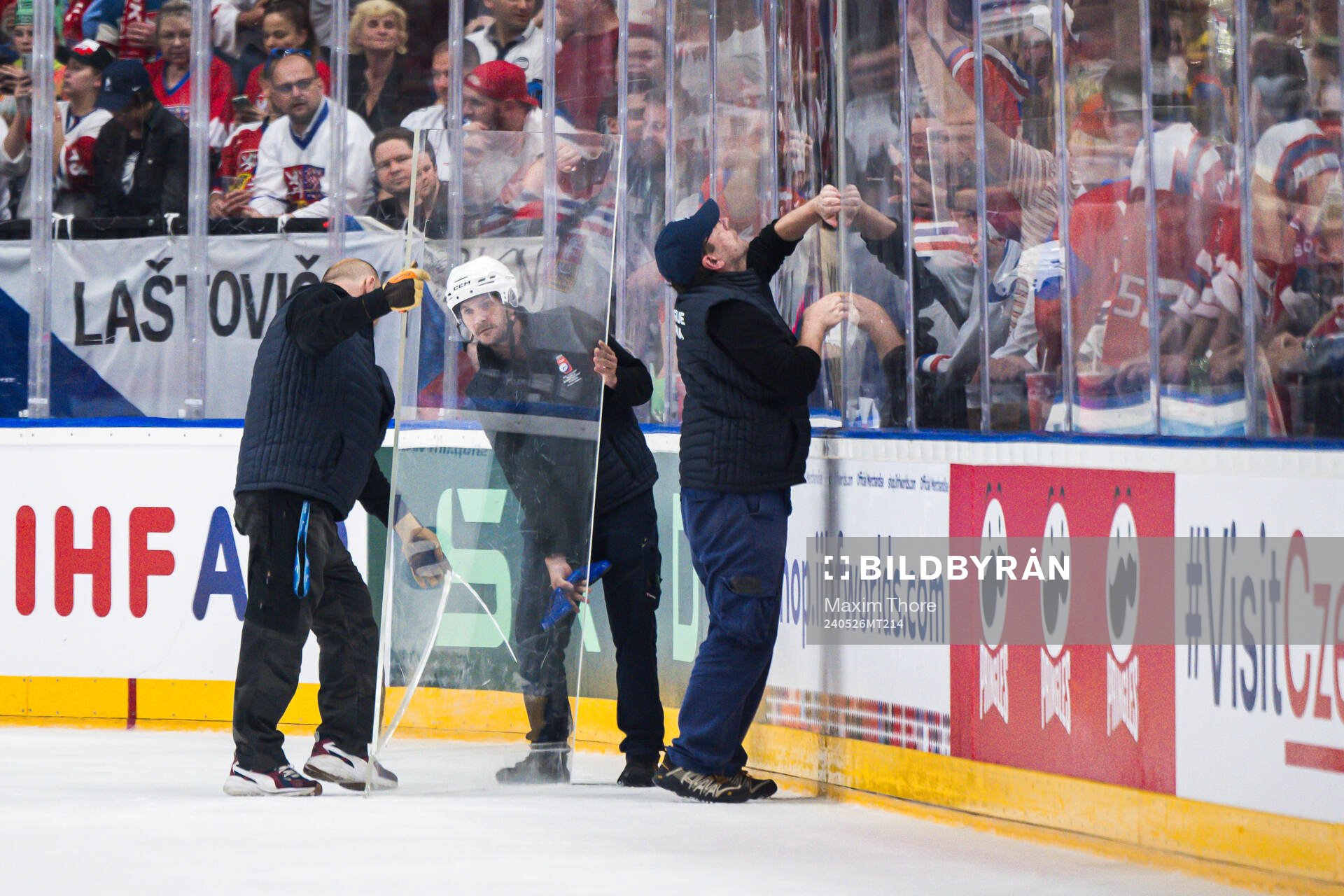 Sheet of plexi glass being replaced
