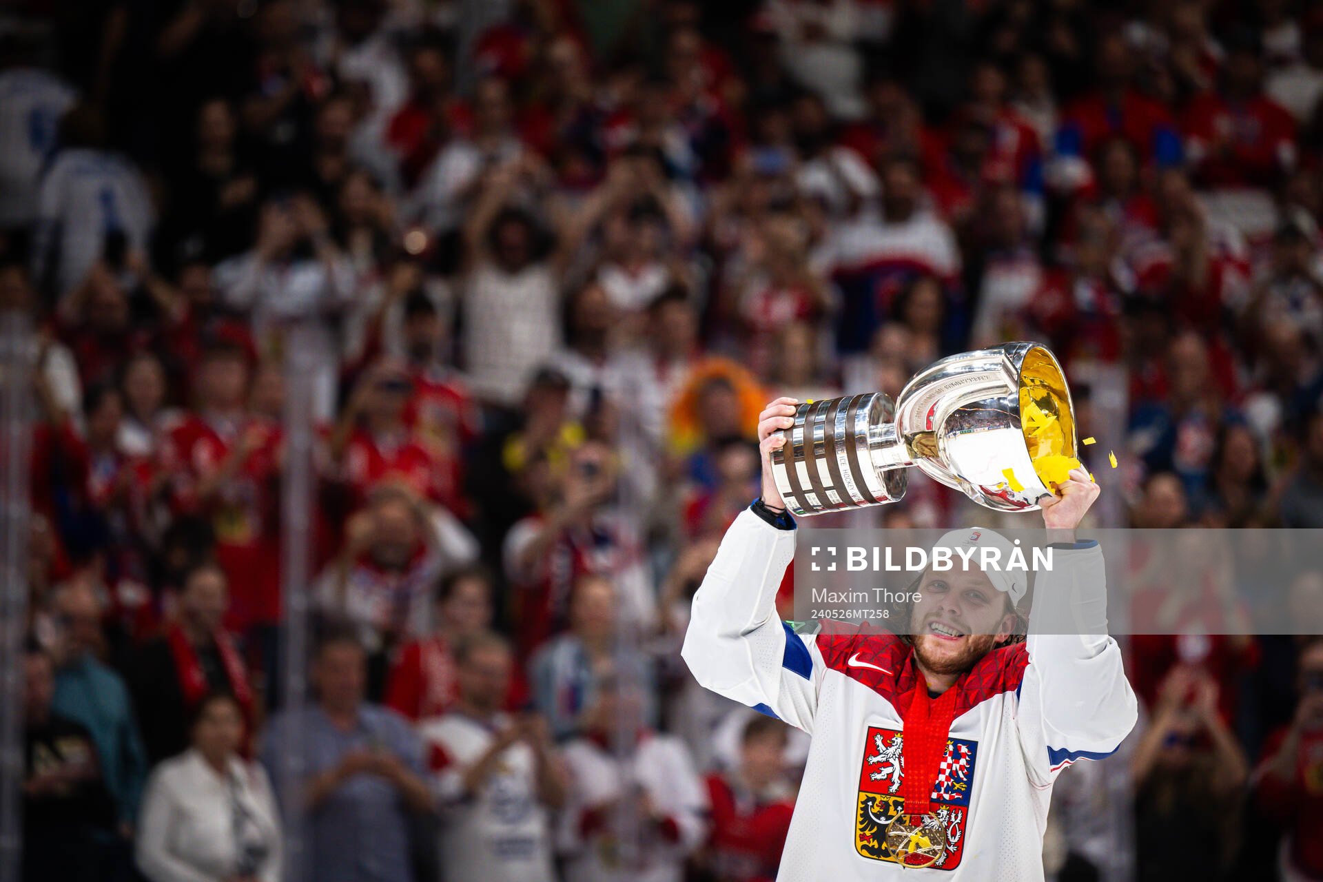 David Pastrnak of Czech Republic celebrates with the trophy