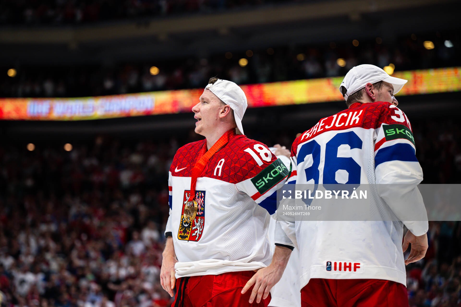 Ondrej Palat and Jakub Krejcik celebrate with their gold