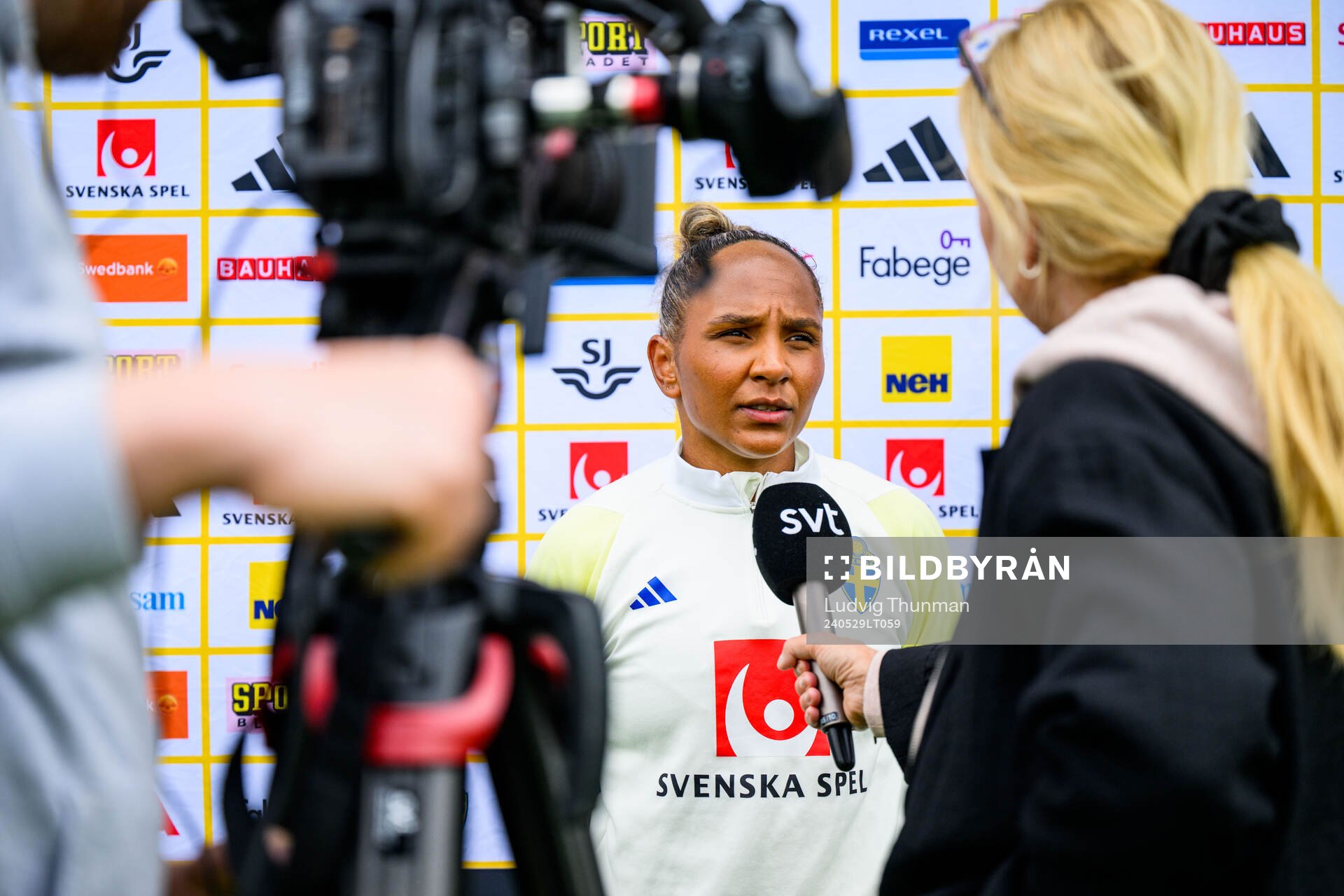 Madelen Janogy of Sweden is interviewed by the media
