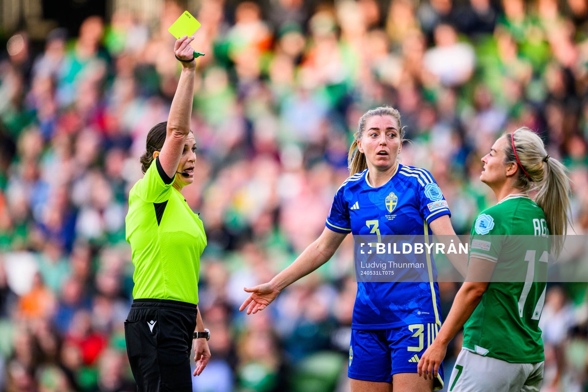 Referee Katalin Kulcsár, Linda Sembrant of Sweden and Lily