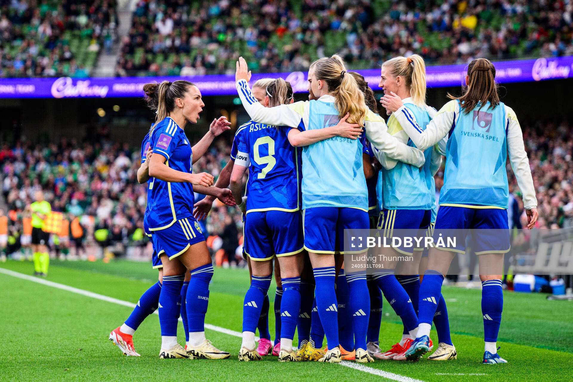 Fridolina Rolfö of Sweden celebrates with team mates