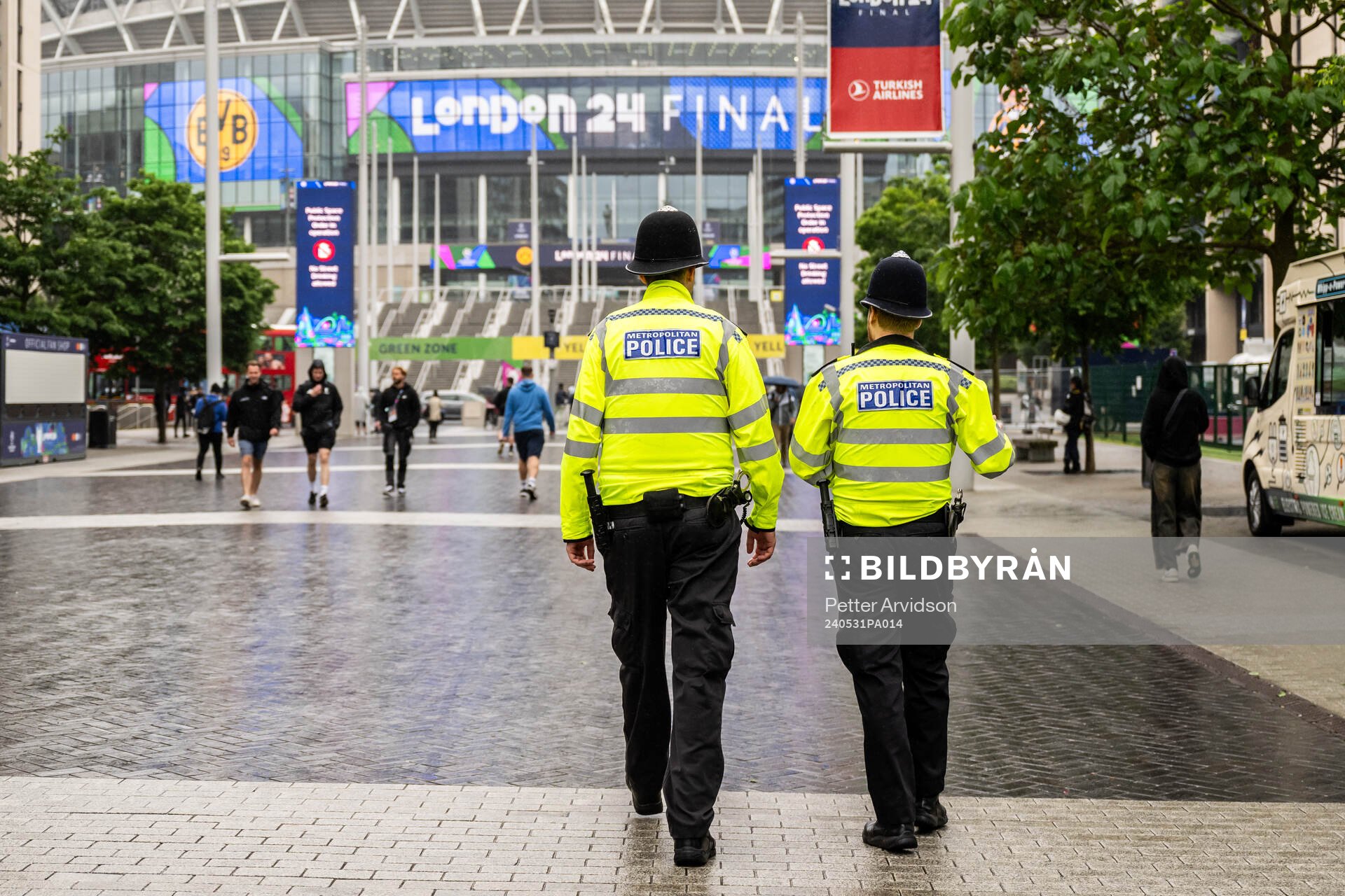 Police officers are seen outside the stadium