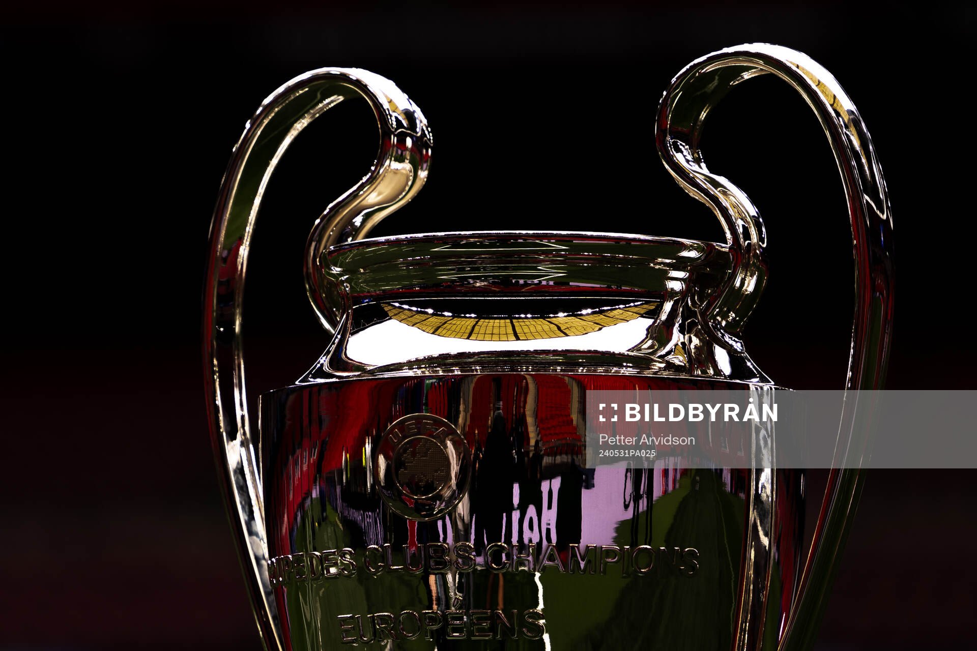 The Champions League trophy is displayed inside the stadium