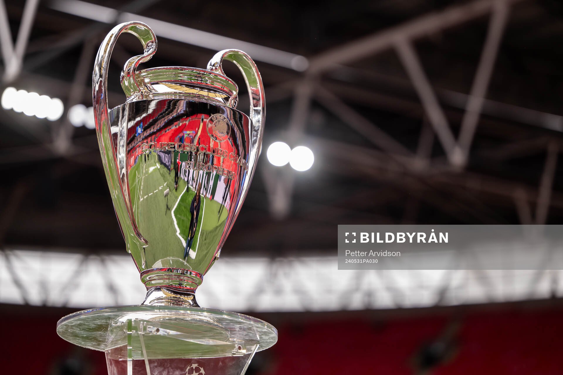 The Champions League trophy is displayed inside the stadium