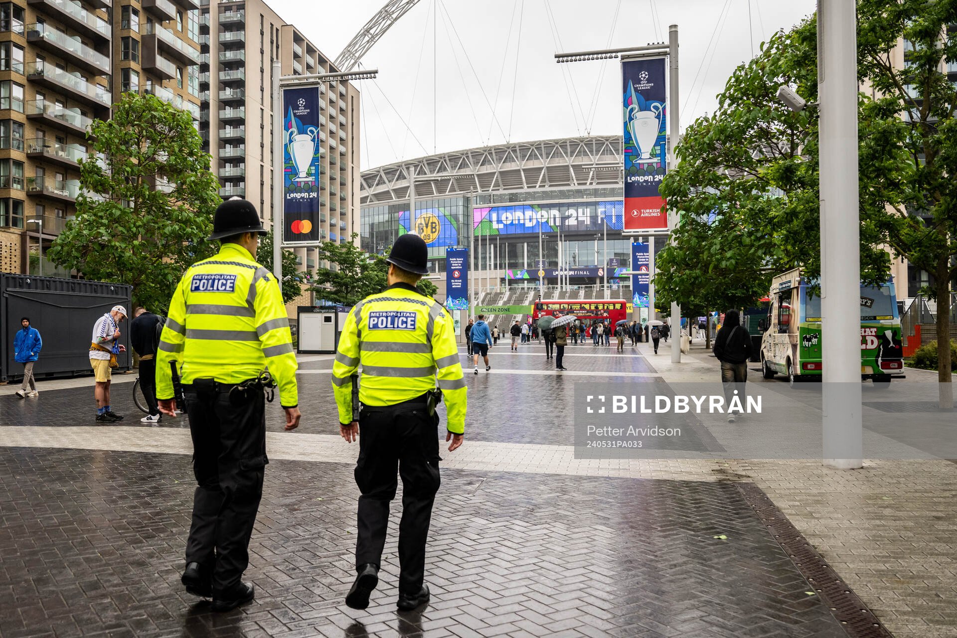 Police officers are seen outside the stadium