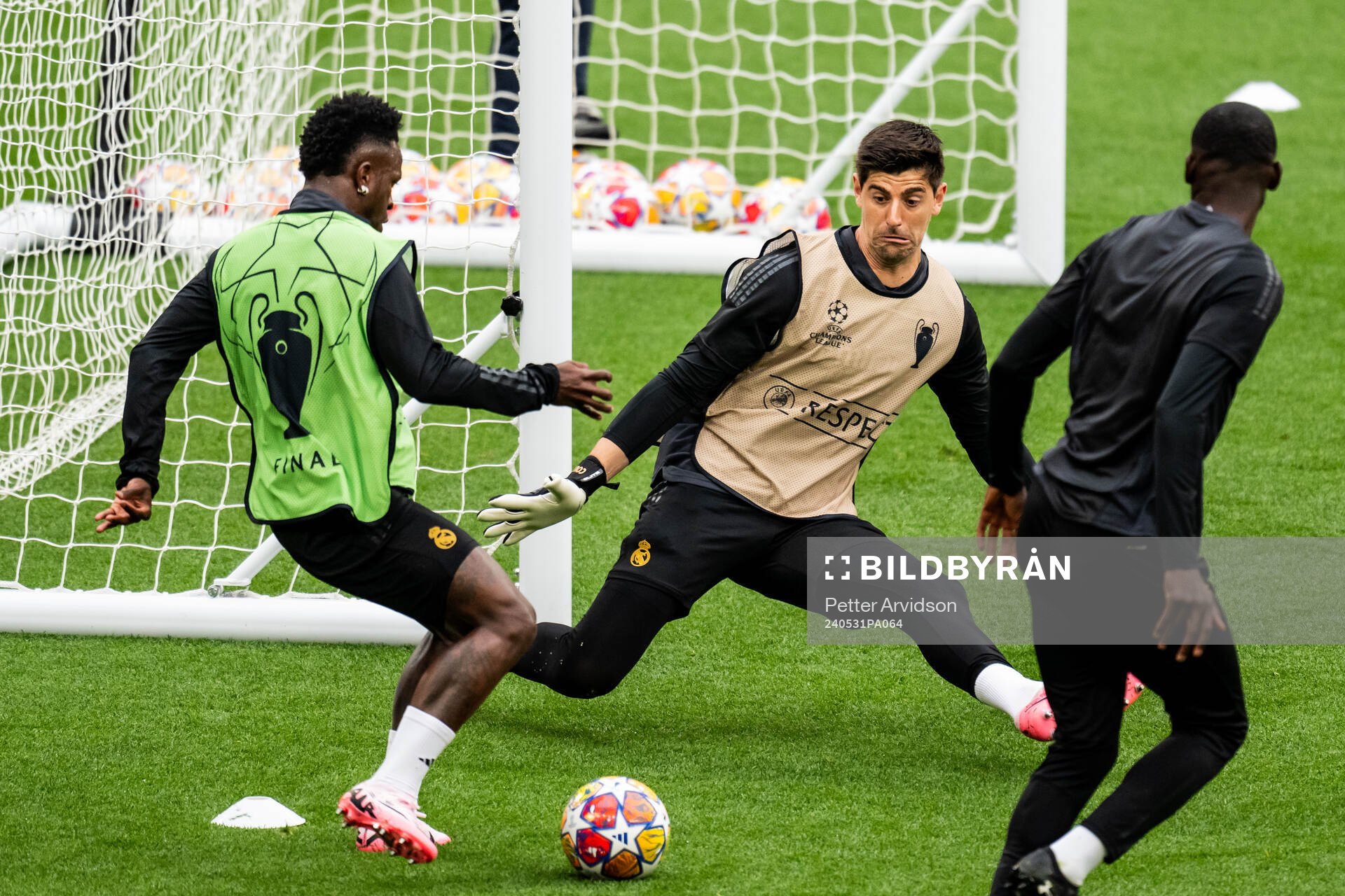 Vinicius Junior and goalkeeper Thibaut Courtois of Real