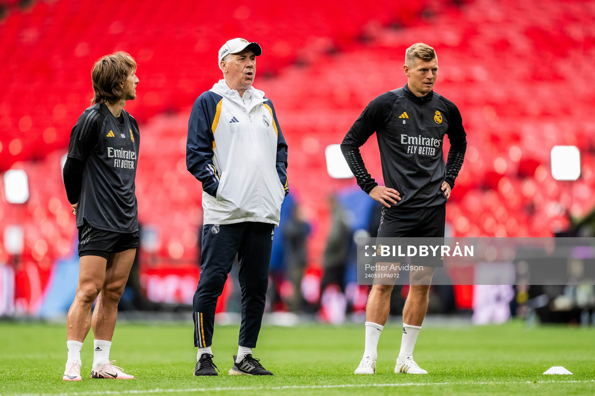 Luka Modric, Head coach Carlo Ancelotti and Toni Kroos of