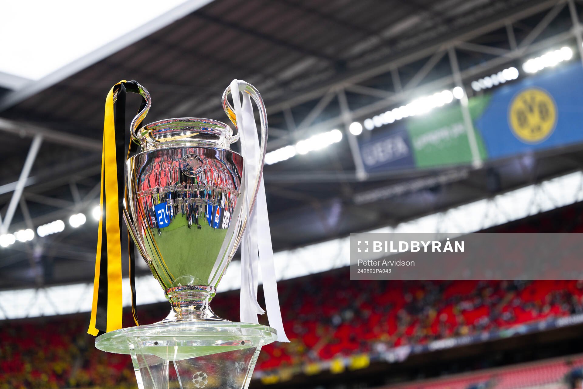 The Champions League trophy is displayed inside the stadium