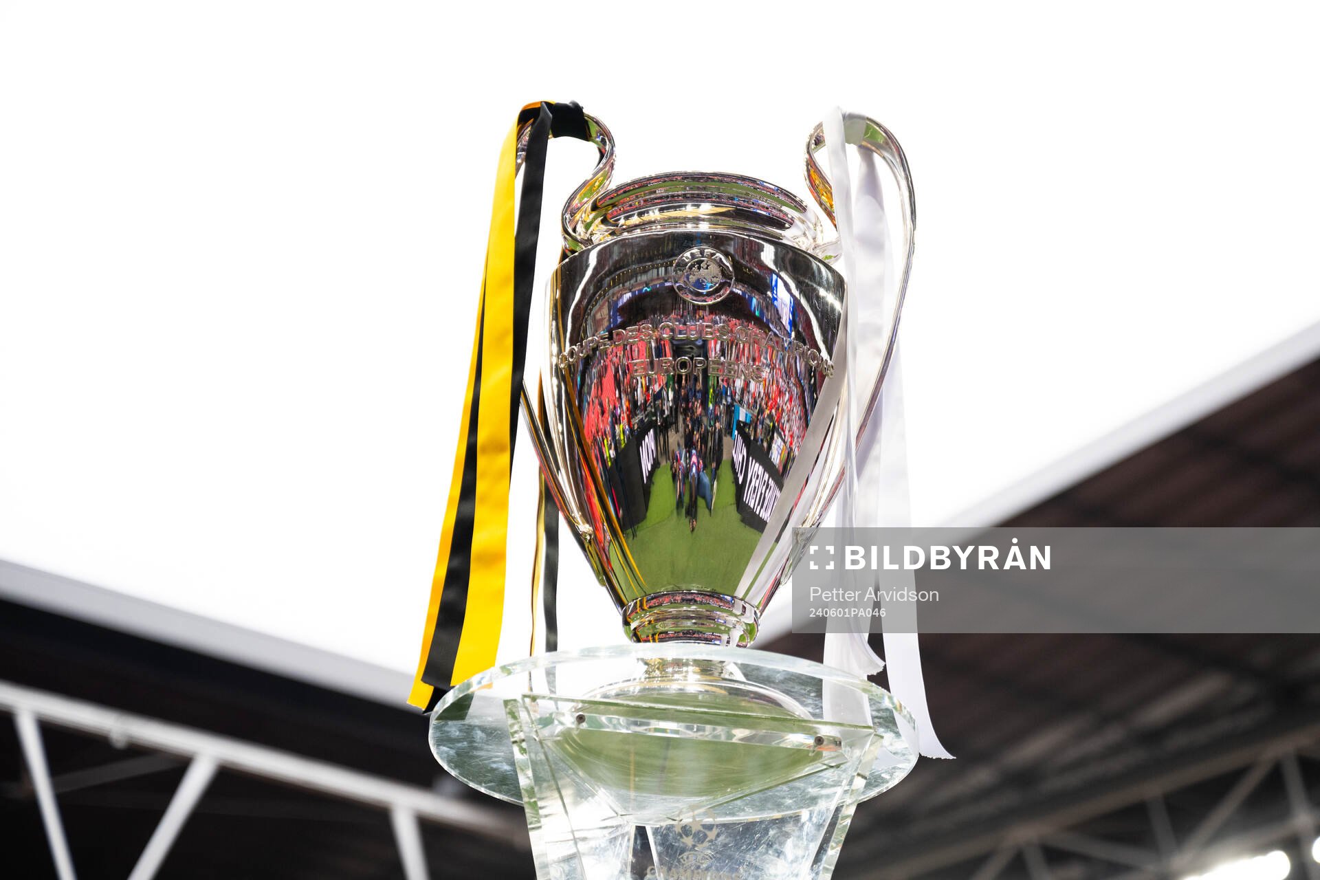 The Champions League trophy is displayed inside the stadium