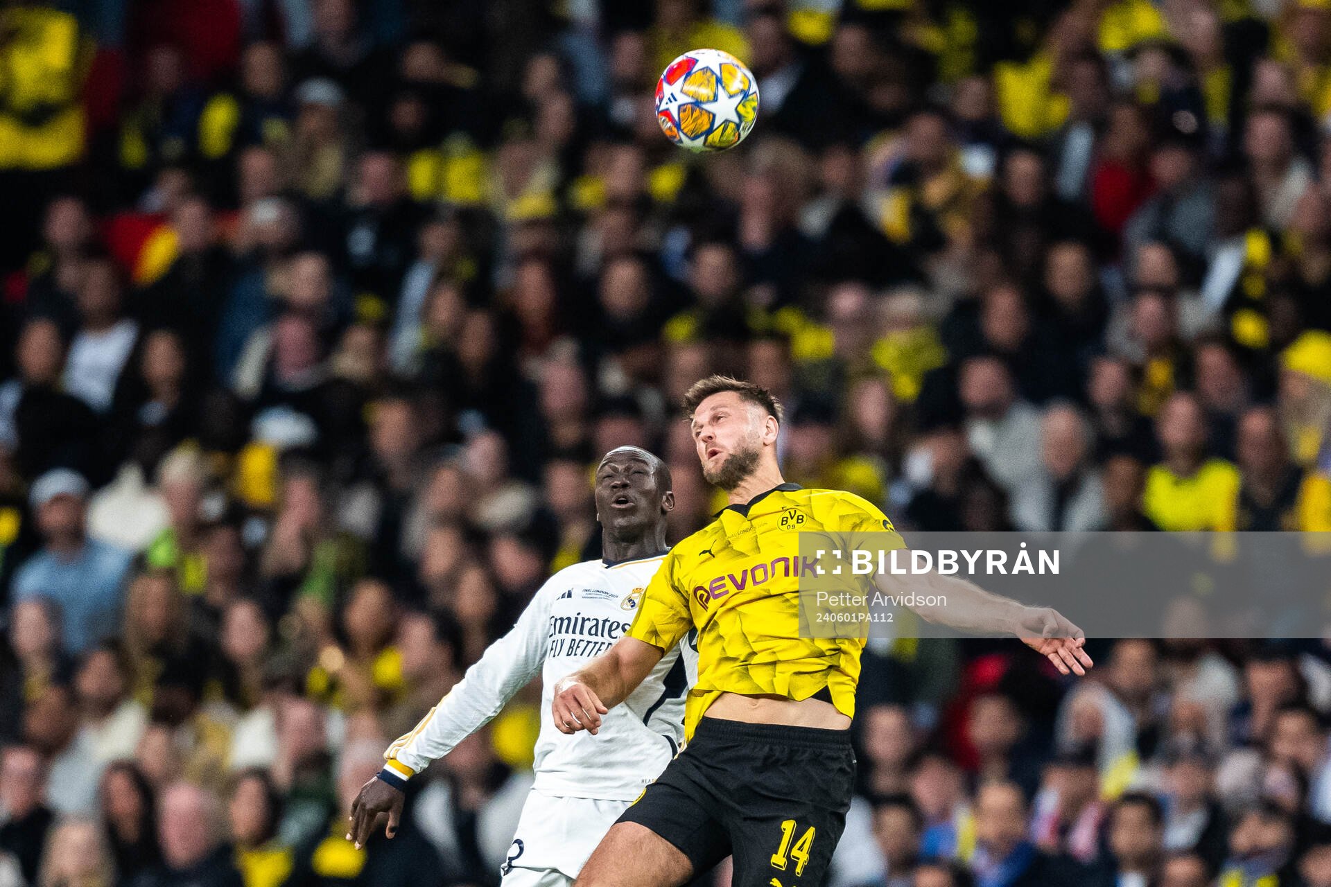 Ferland Mendy of Real Madrid and Niclas Fullkrug of Dortmund