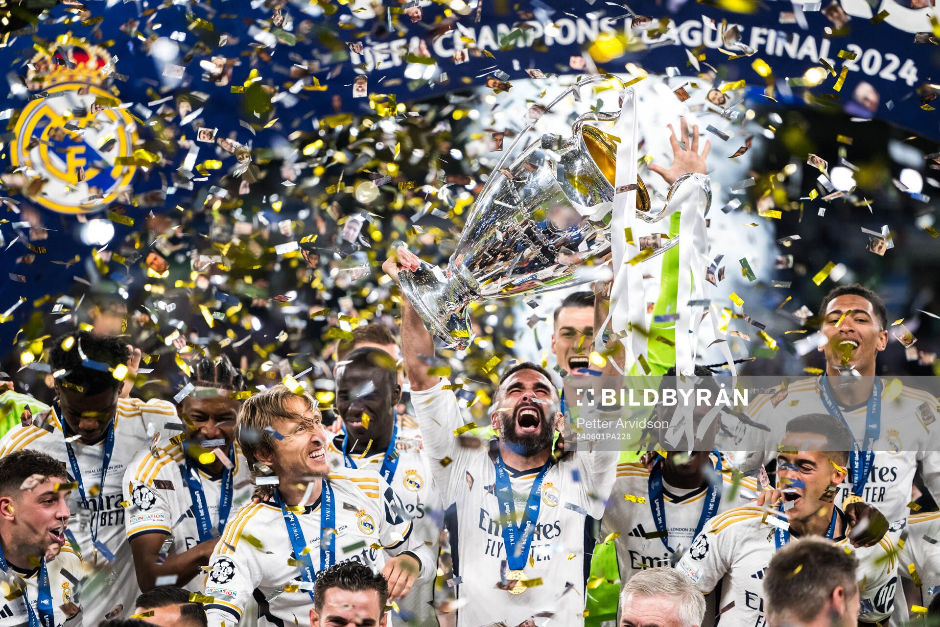 Dani Carvajal of Real Madrid lifts the trophy and celebrate