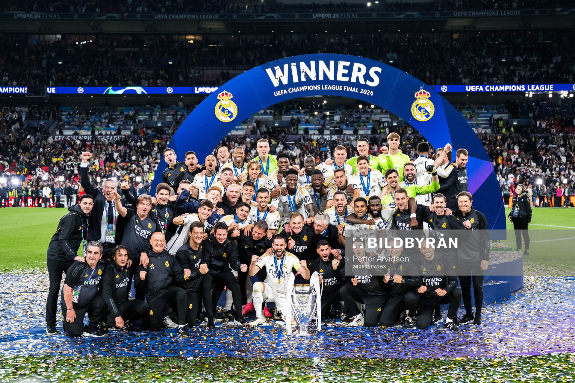 Players of Real Madrid celebrate with the trophy