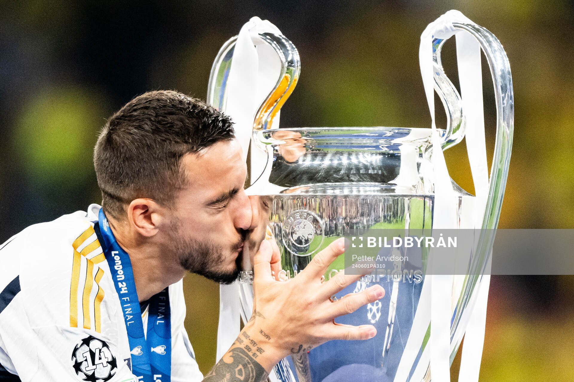 Dani Ceballos of Real Madrid and the trophy