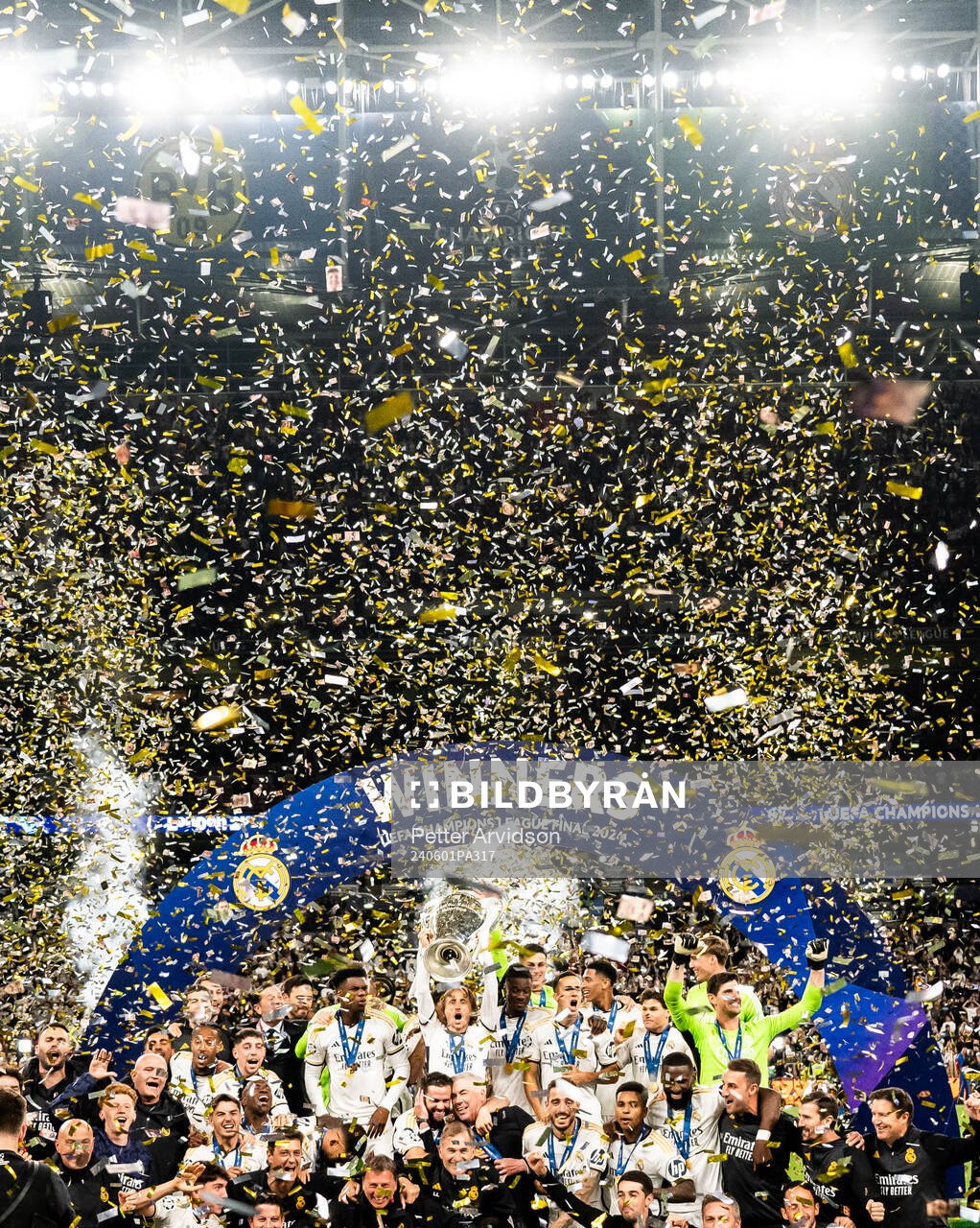 Luka Modric of Real Madrid lifts the trophy