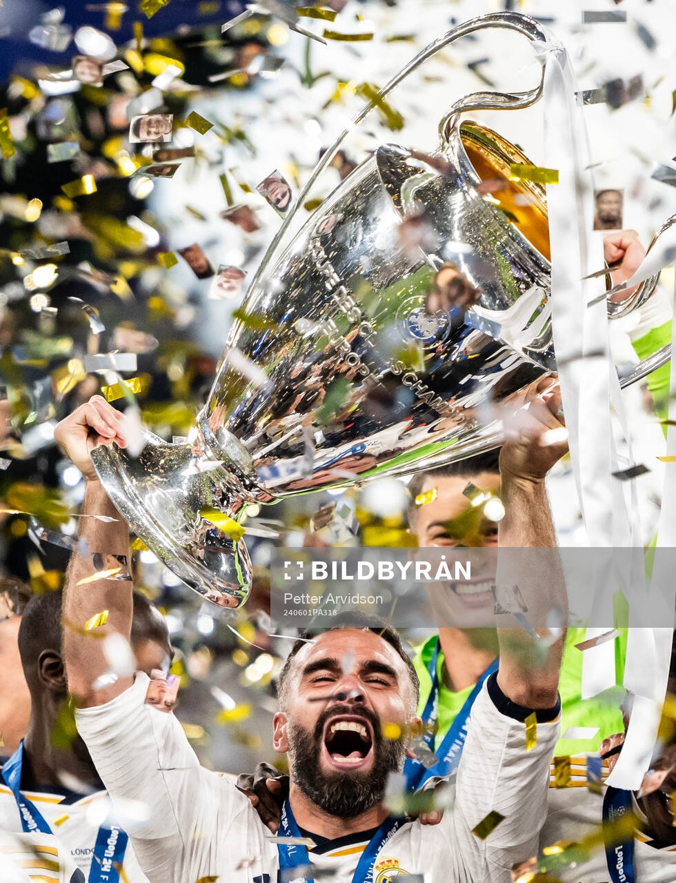 Dani Carvajal of Real Madrid lifts the trophy