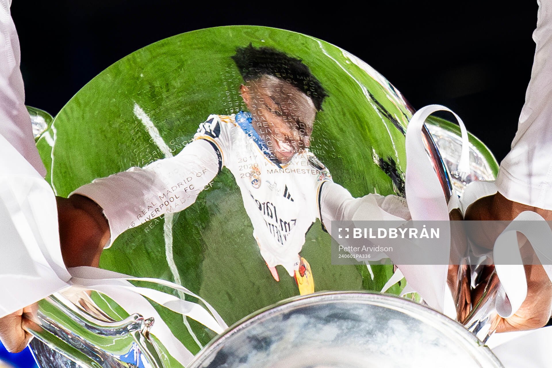A reflection of Aurelien Tchouameni of Real Madrid is seen