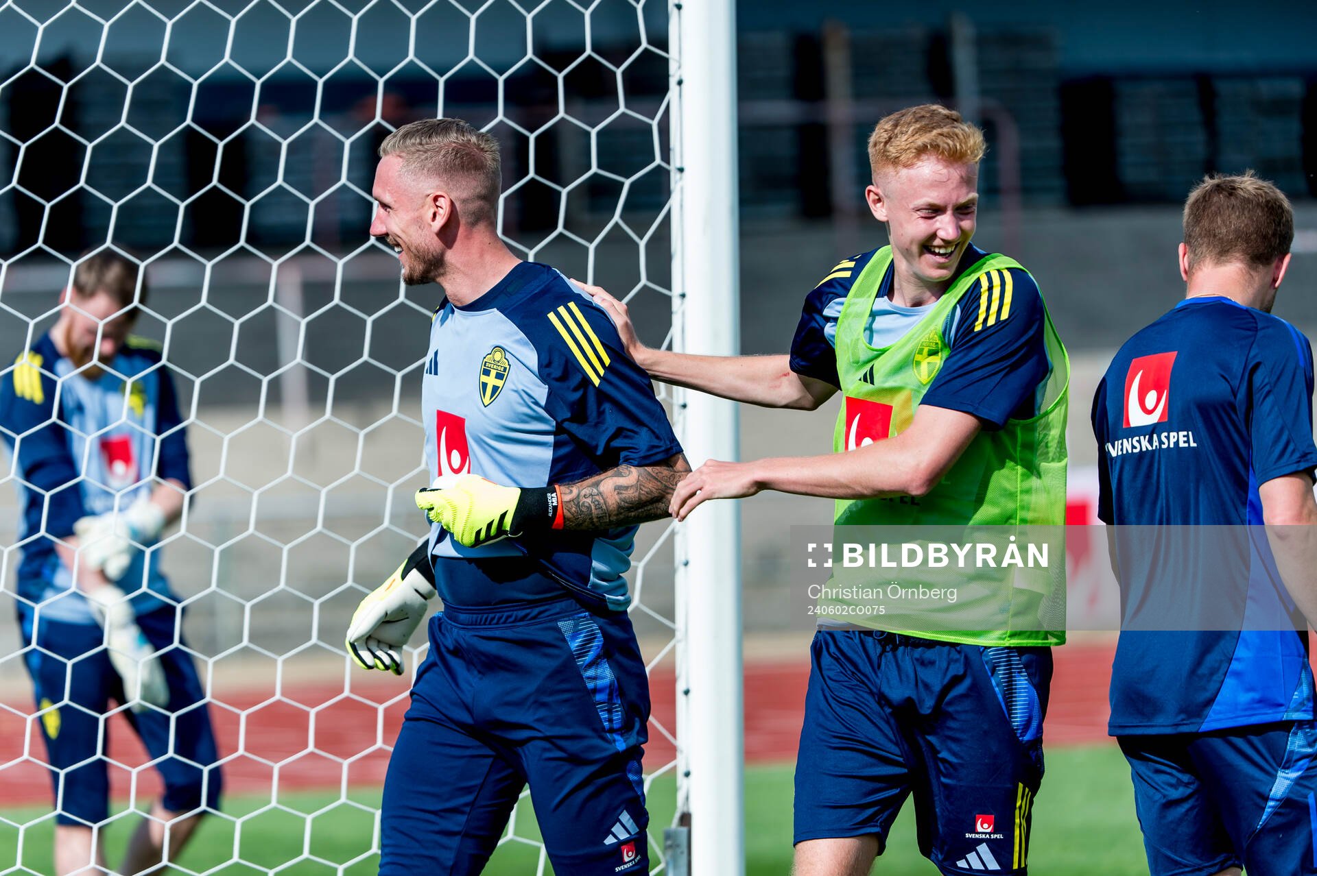 Goalkeeper Robin Olsen and Hugo Larsson of Sweden