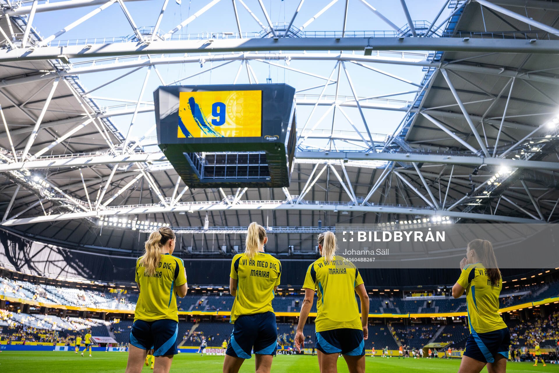 Players of Sweden, with a warm up shirt dedicated to team