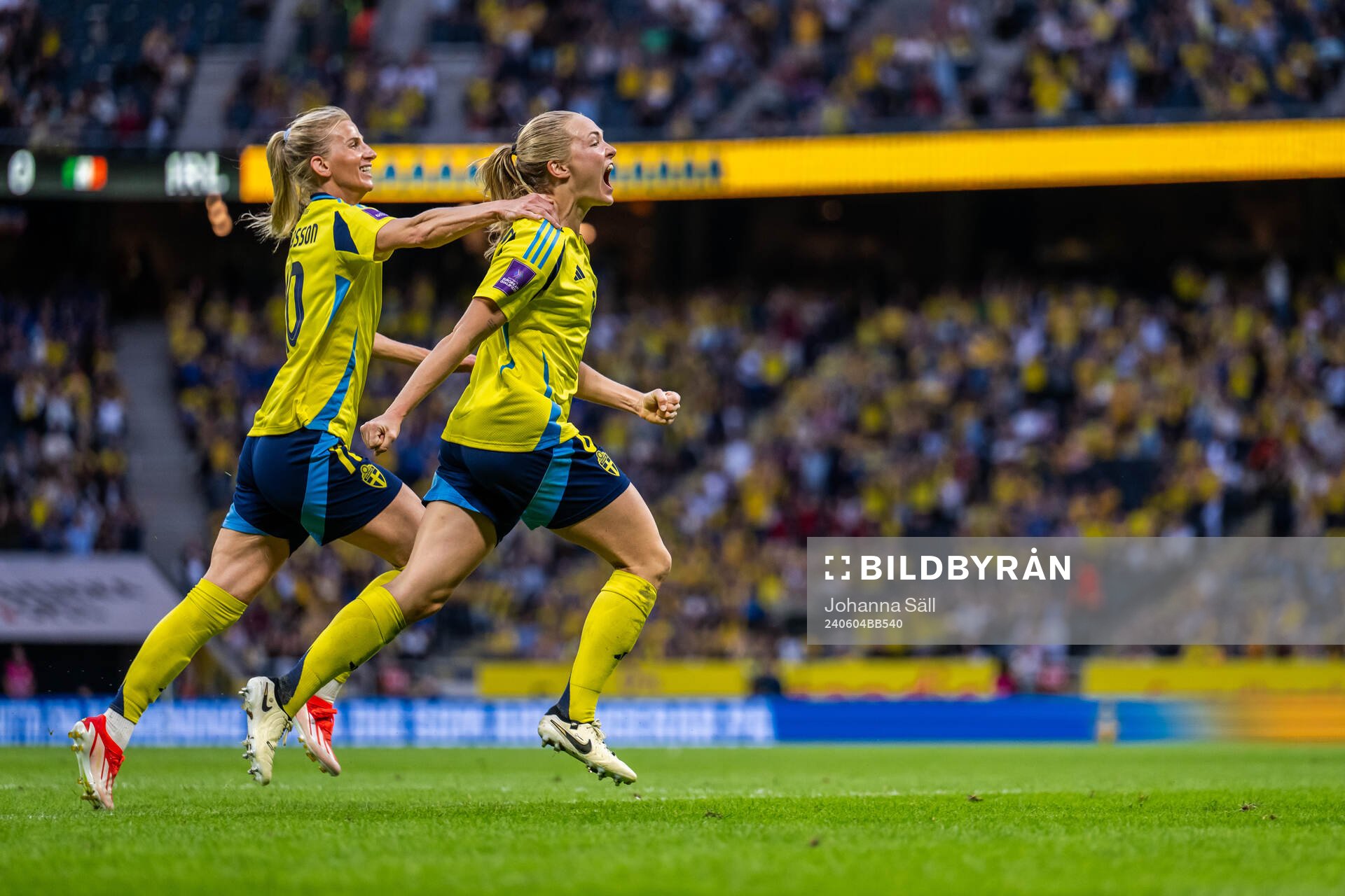 Sofia Jakobsson and Magdalena Eriksson of Sweden celebrate