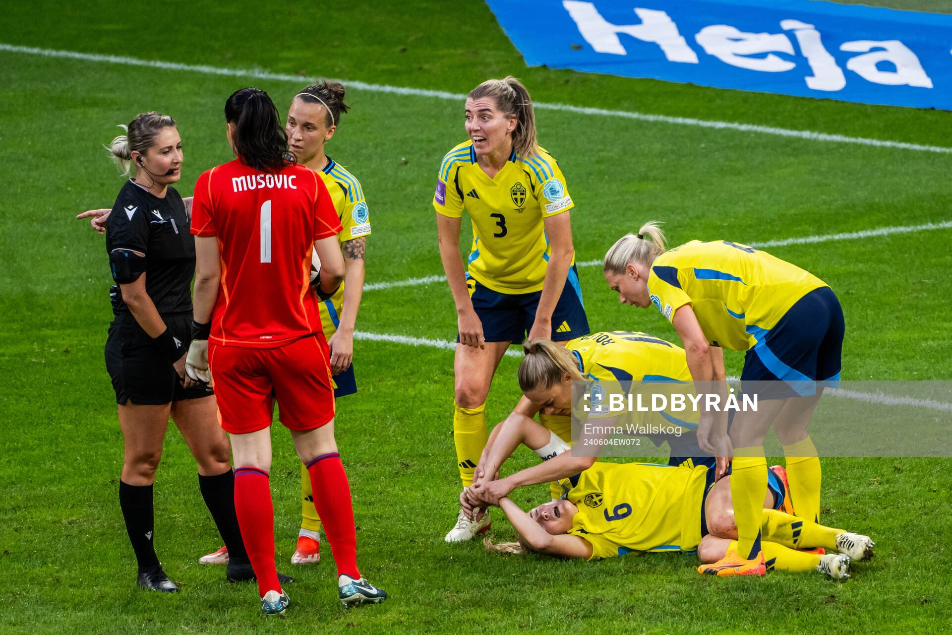 Referee Alina Peşu talks to goalkeeper Zecira Musovic and