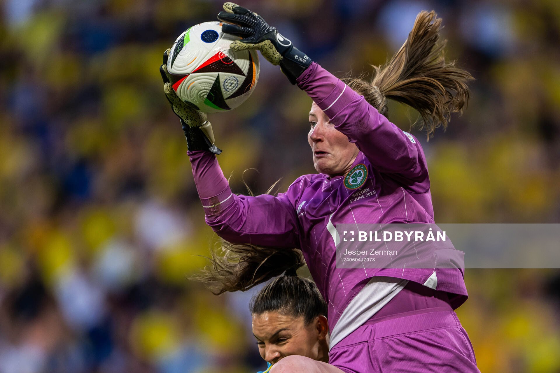 Johanna Rytting Kaneryd of Sweden and goalkeeper Courtney